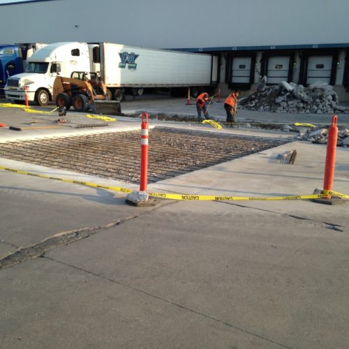 Concrete paving contractors at work