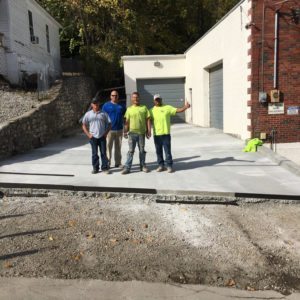 A team of concrete paving contractors